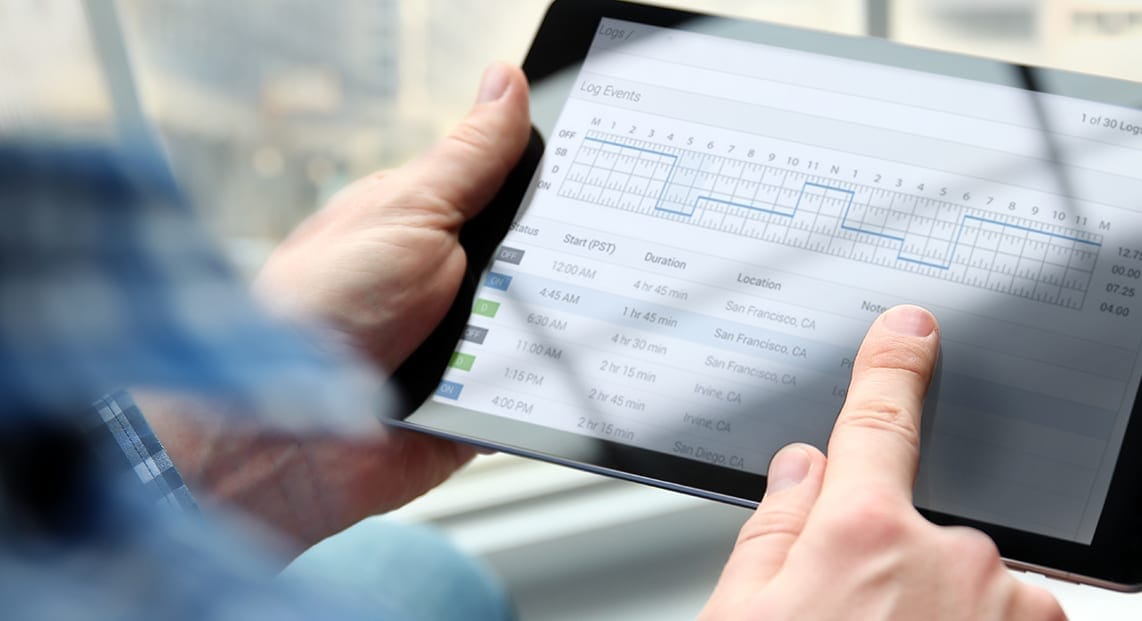 a person holding a tablet