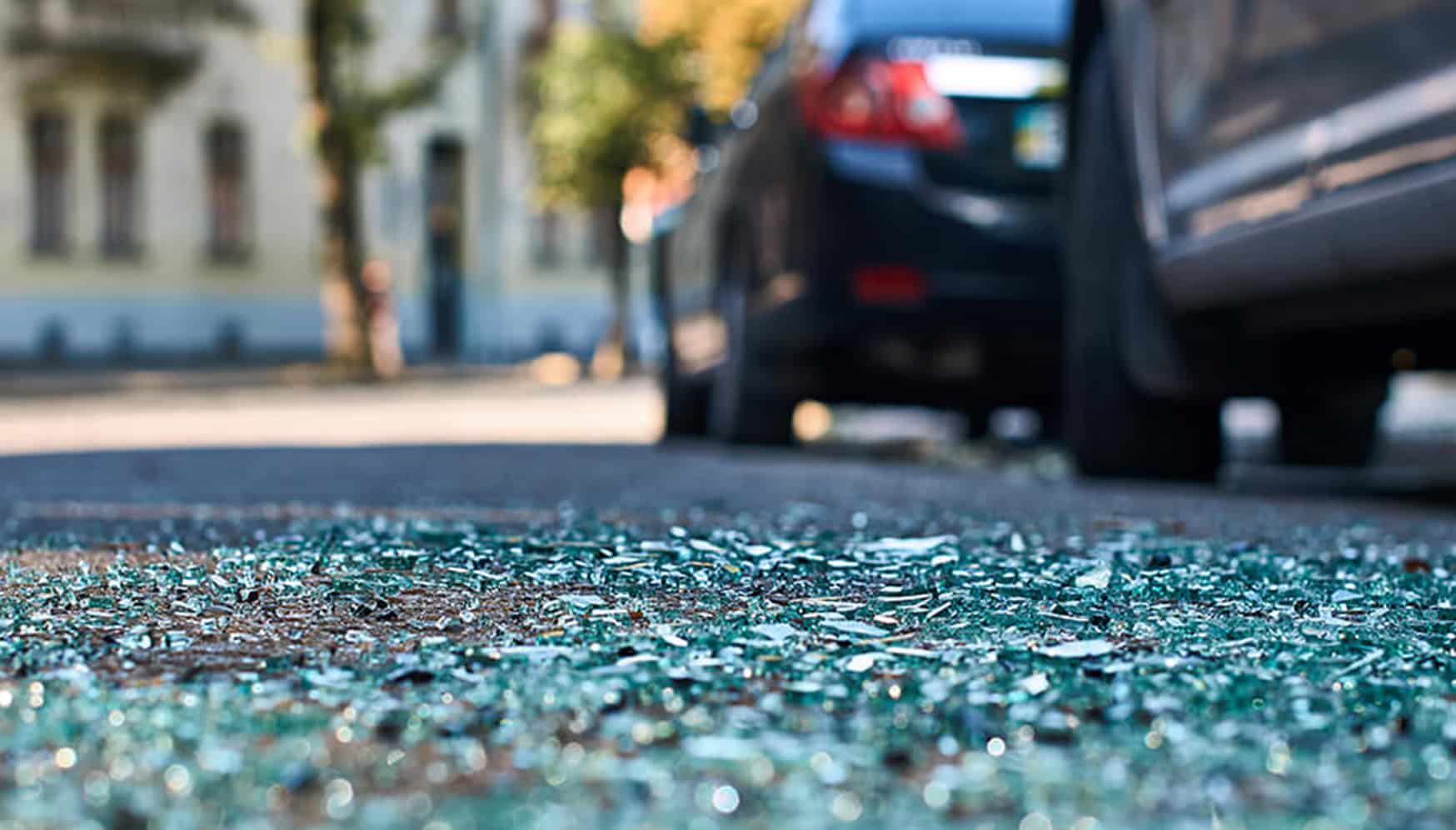 a broken glass on the ground