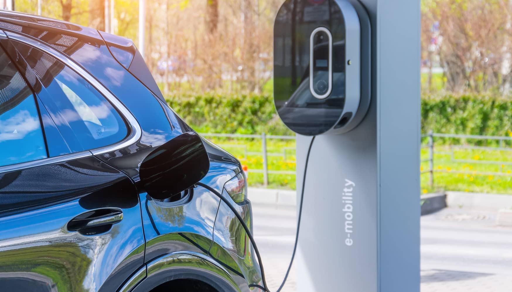 a car charging at a charging station
