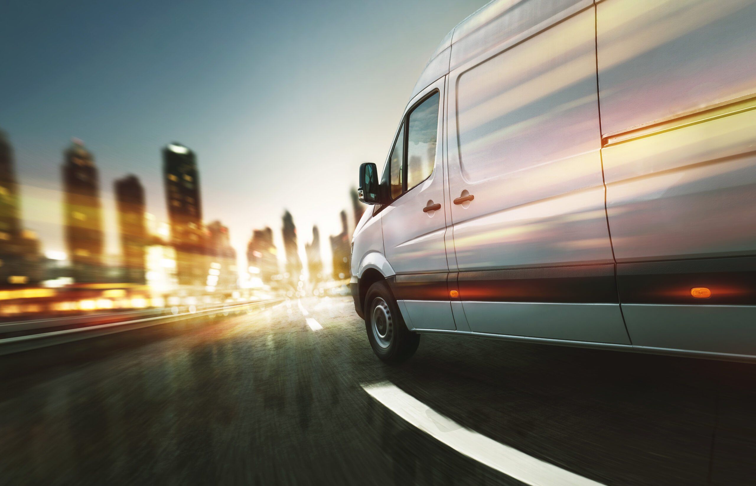 Van speeding through the city at night