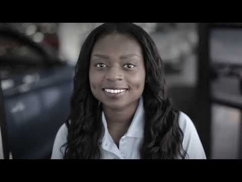 a woman smiling at the camera