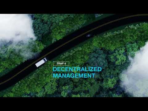 a road with trees and clouds