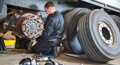 a man working on a wheel