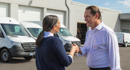 a man and woman shaking hands