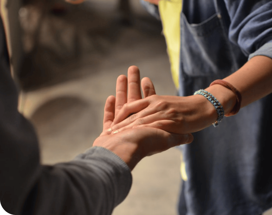 Holman employees holding hands