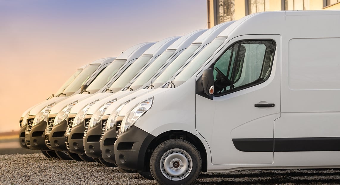 a row of white vans