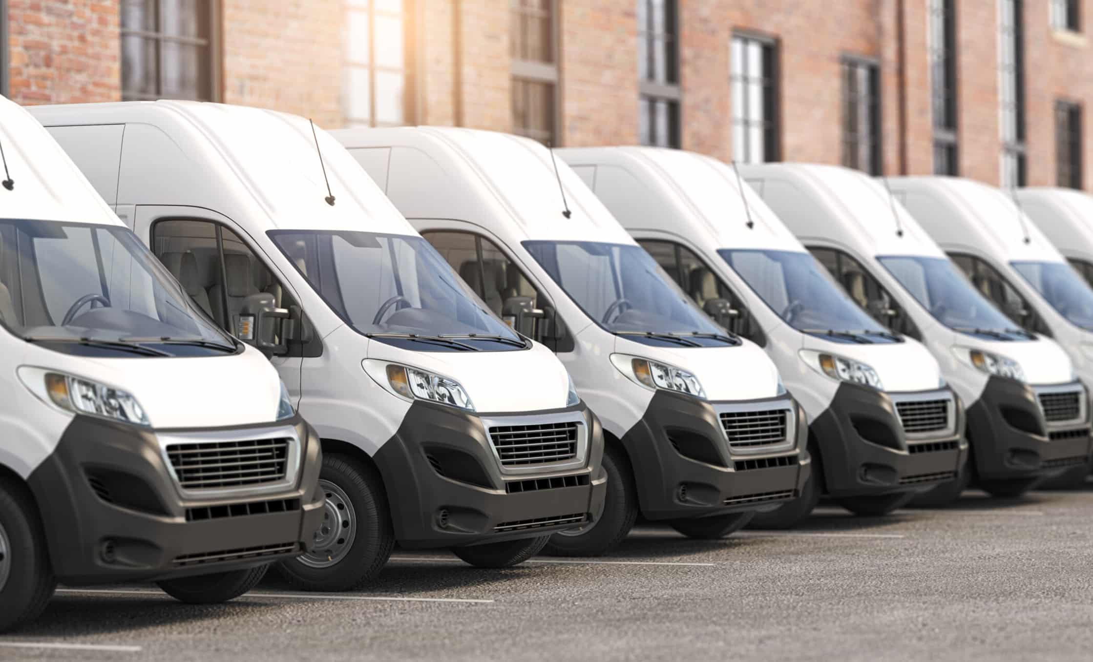 a row of white vans