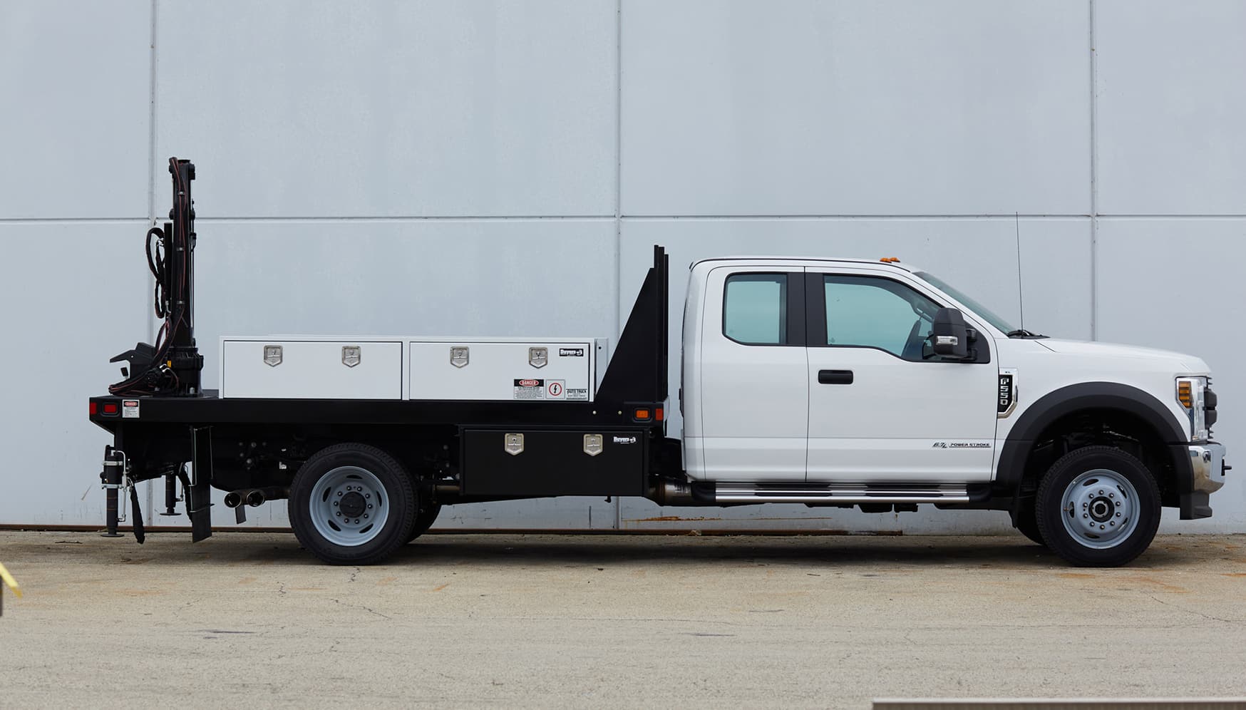 a white truck with a flat bed