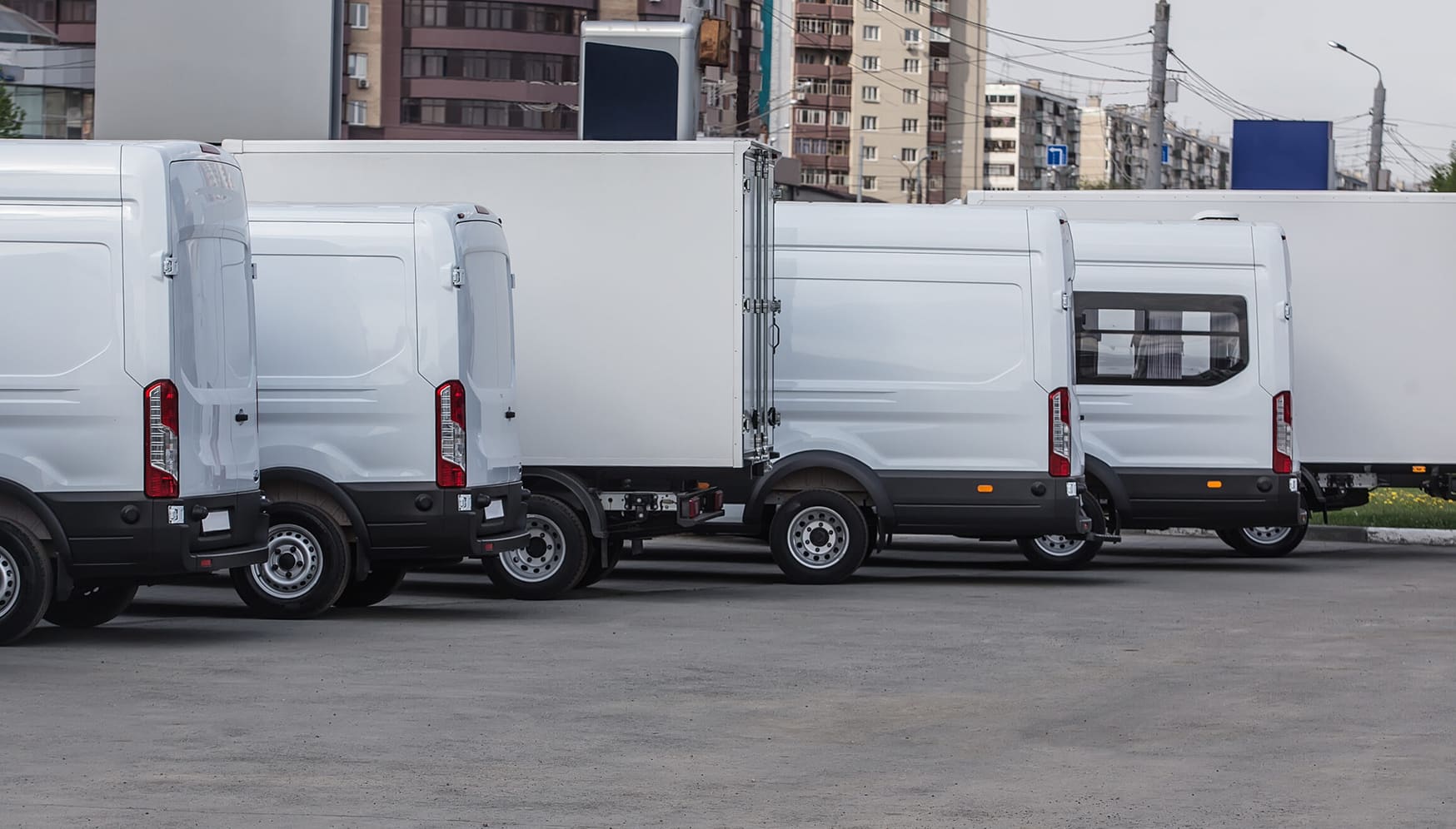 a row of white vans