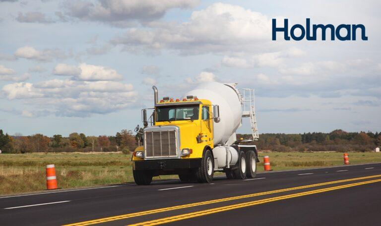 a yellow truck on the road