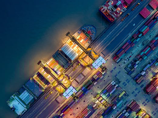 cargo being loaded at a shipping dock 