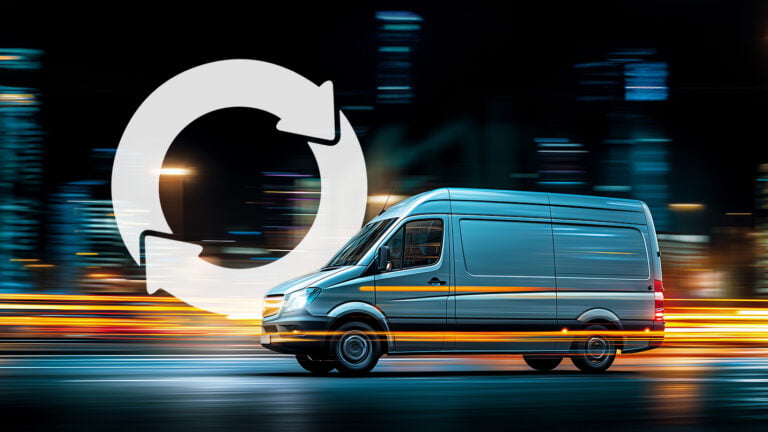 Van in motion with city lights