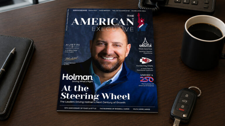 Magazine cover featuring smiling man.